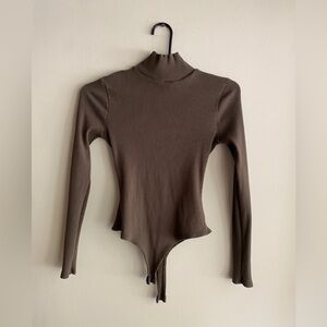 Dark green bodysuit turtleneck